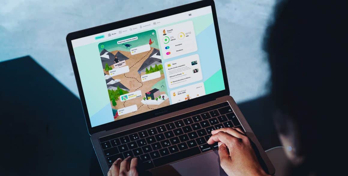 A person playing Attensi PORTAL on a laptop, journey